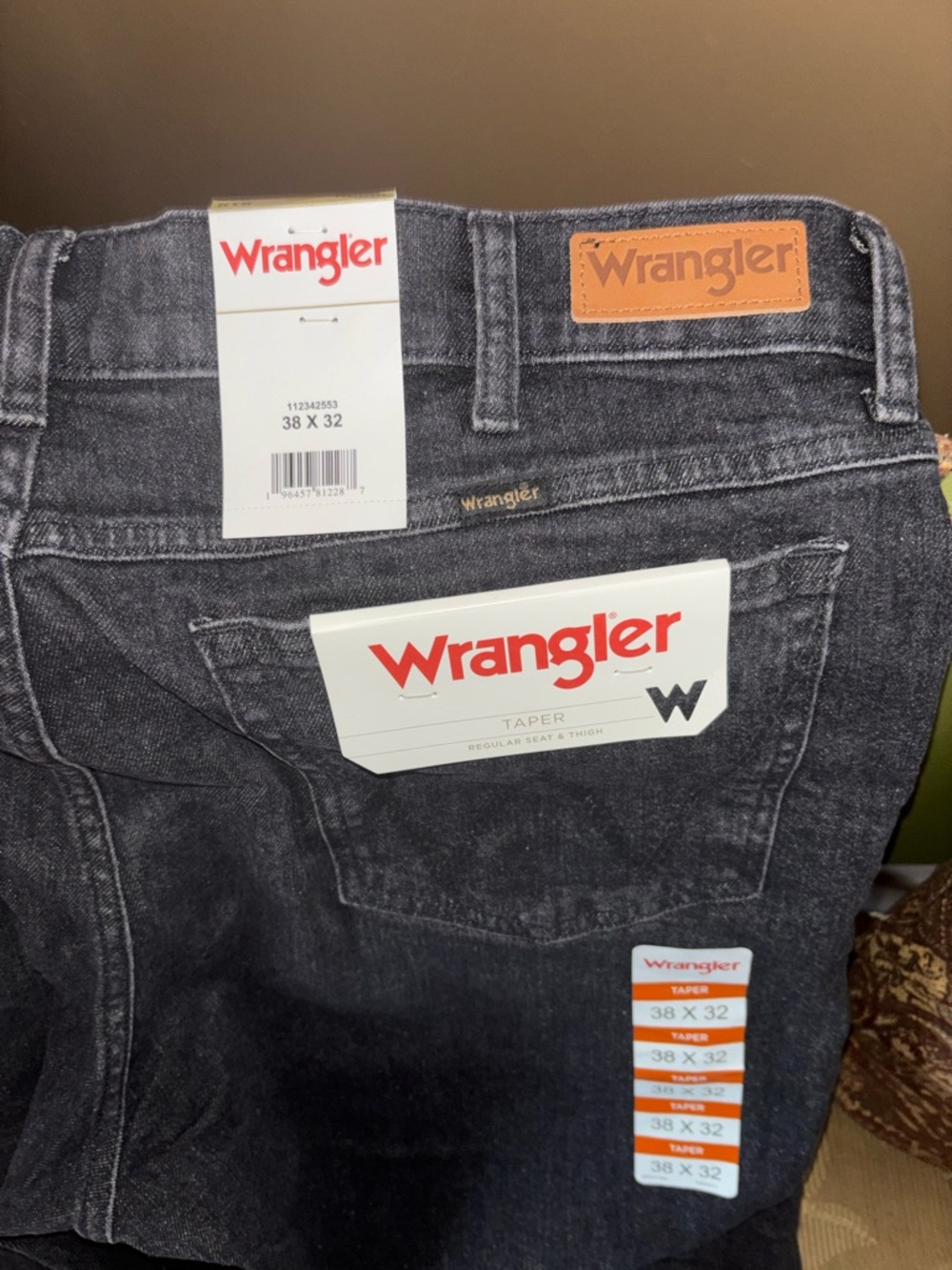 Wrangler Blue  Wash Tapered Jeans with Tan Leather Patch